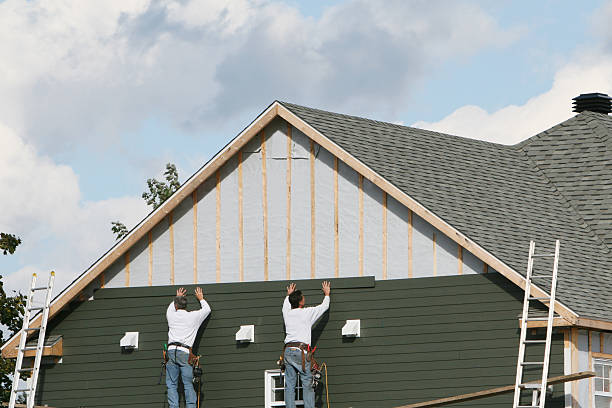 Professional Siding technician working in Batavia, NY